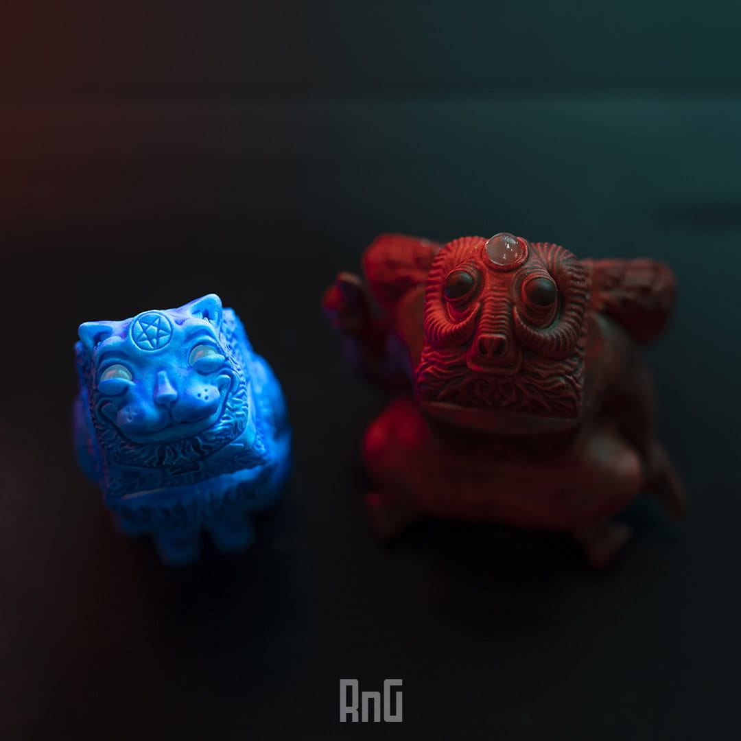 Red and blue artisan keycaps displays